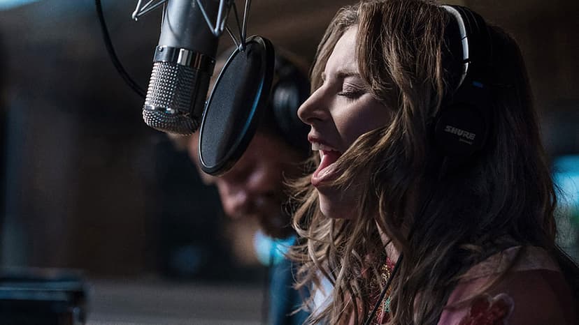 a woman singing facing the microphone